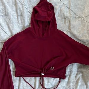 4:13 crop top sweatshirt with pull string at waist.